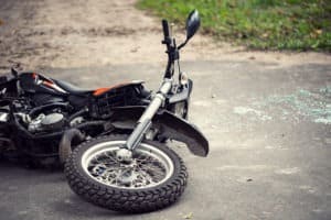 motorcycle fallen on road