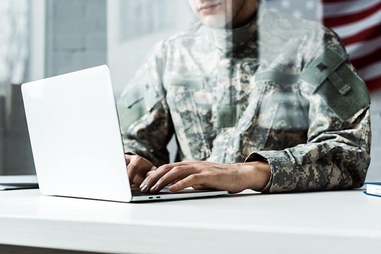soldier on laptop